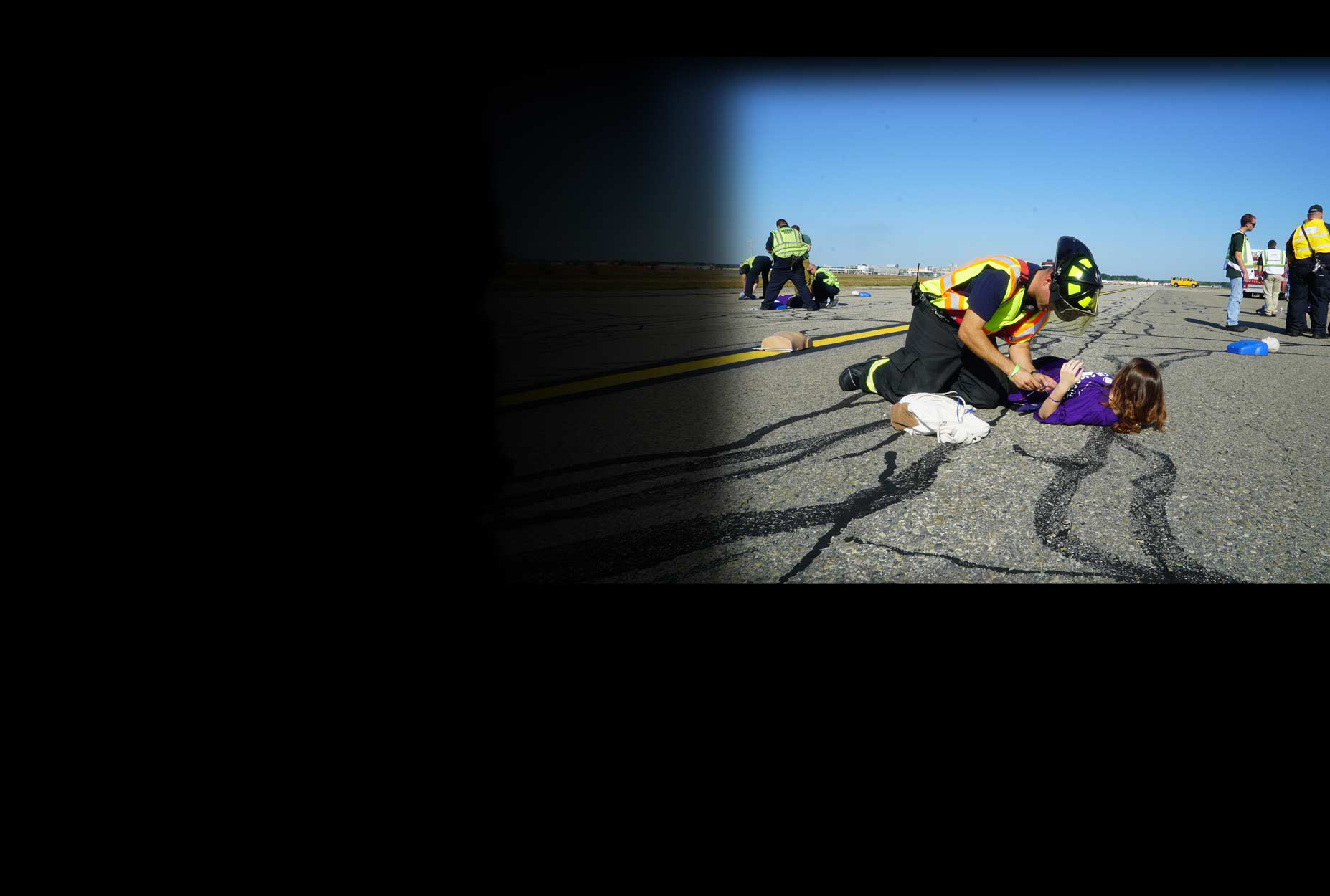 First responder providing medical care to a person on the ground During a routine emergency management exercise in Warwick, Rhode Island, first responders tested FirstNet's capabilities.