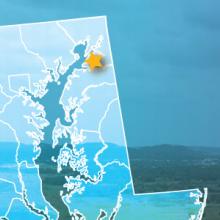 The state of Maryland, with outlined county borders; a cell tower