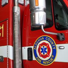 Alachua County Fire Rescue truck parked inside fire station