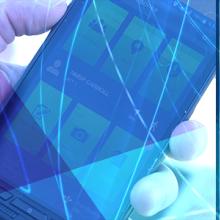 An emergency manager points towards a screen displaying a map, an officer holds a smartphone displaying an app, an EMS technician interacts with a display screen